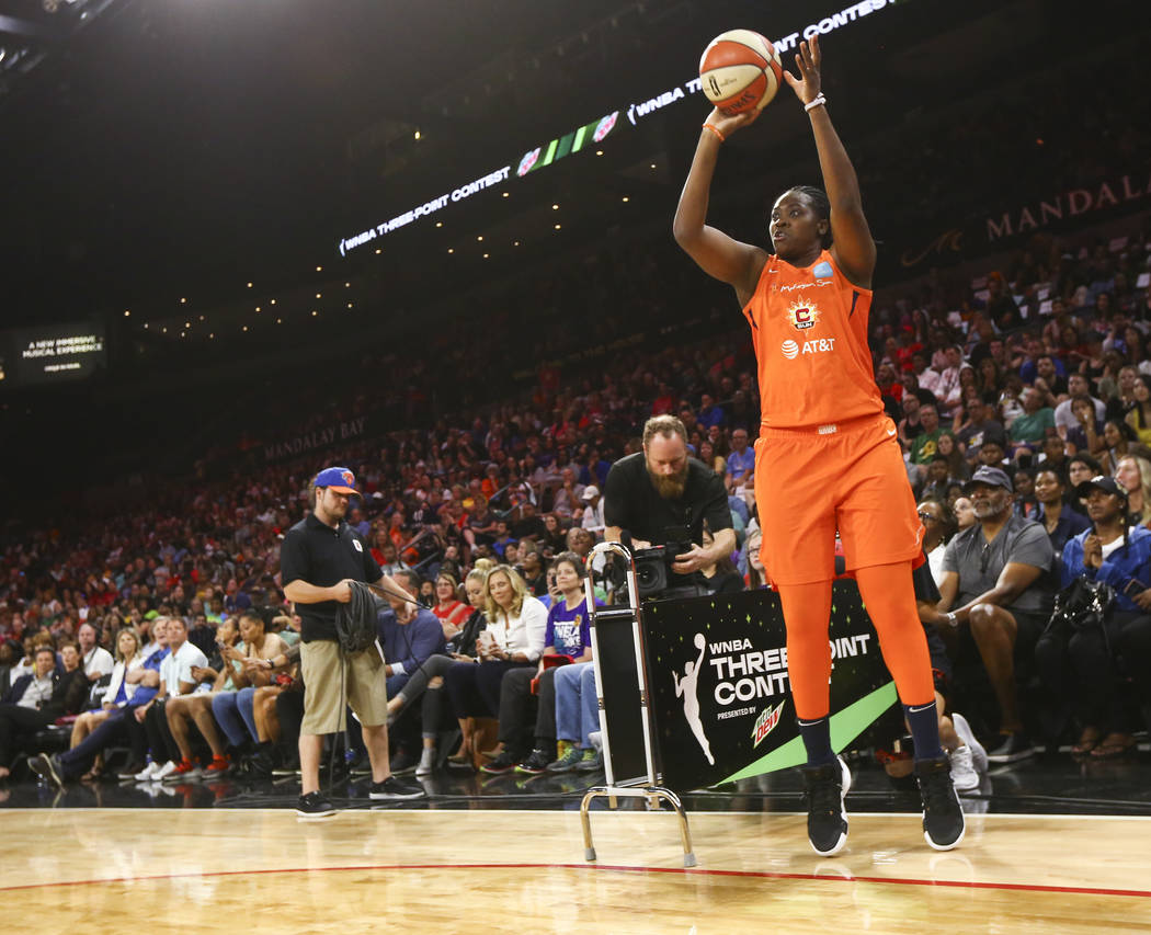 Connecticut Sun's Shekinna Stricklen competes in the three-point shooting challenge during the ...