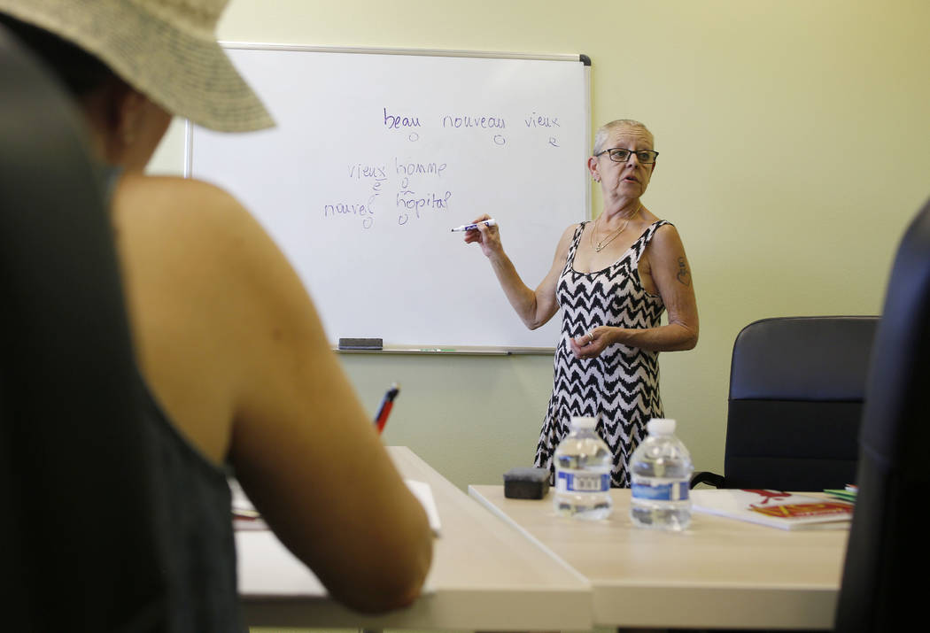 Instructor Catherine Rozenek teaches an intermediate French class at the Alliance Francaise de ...