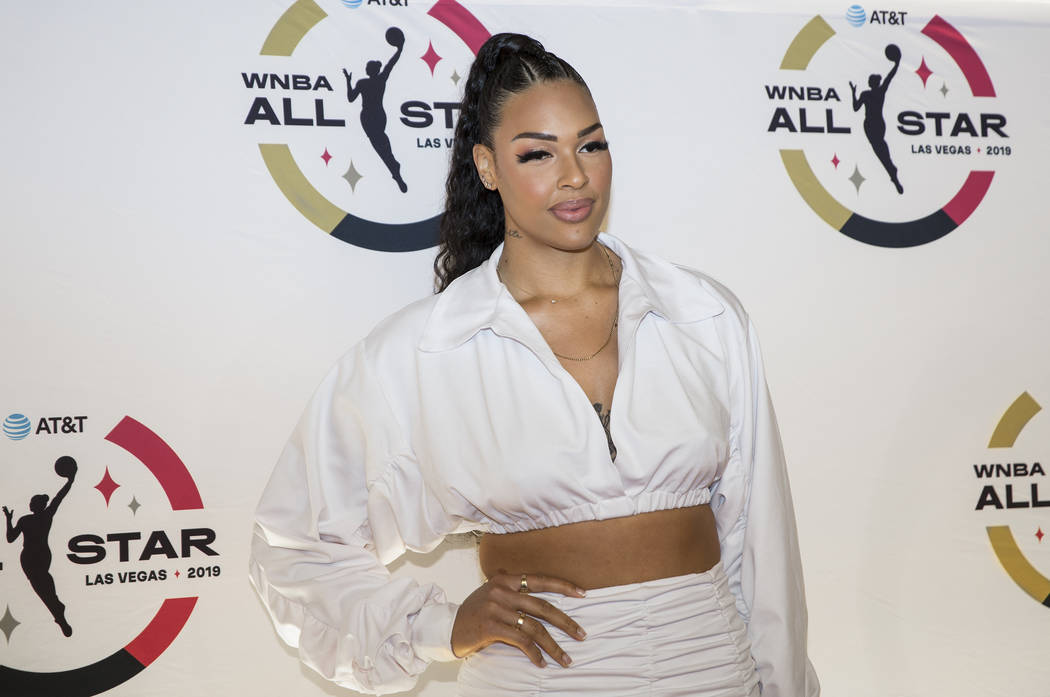 Las Vegas Aces center Liz Cambage walks the WNBA Orange Carpet outside Della's Kitchen at Delan ...