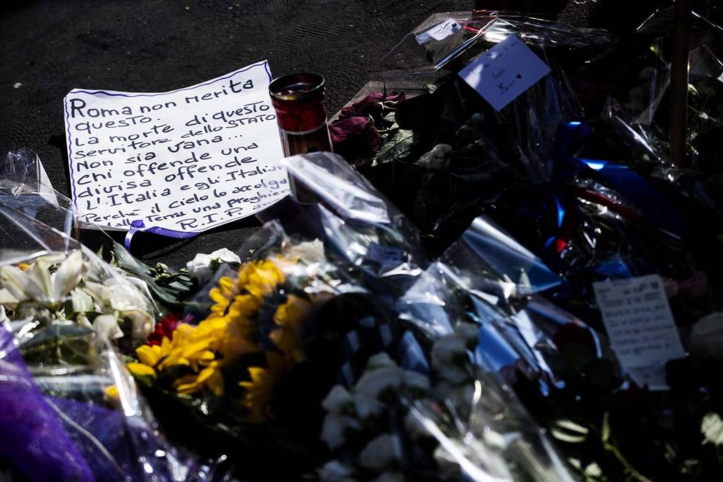 Flowers and messages are left on the spot, in Rome, Saturday, July 27, 2019, where Carabinieri ...