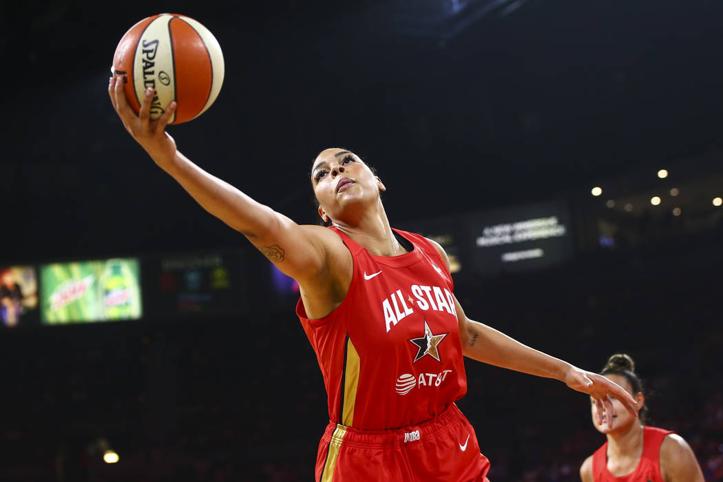 Las Vegas Aces' Liz Cambage gets a rebound during the first half of the WNBA All-Star Game at t ...