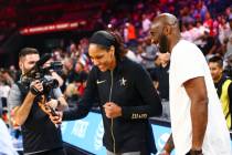 Las Vegas Aces' A'ja Wilson records a video with NBA legend Kobe Bryant before the start of the ...