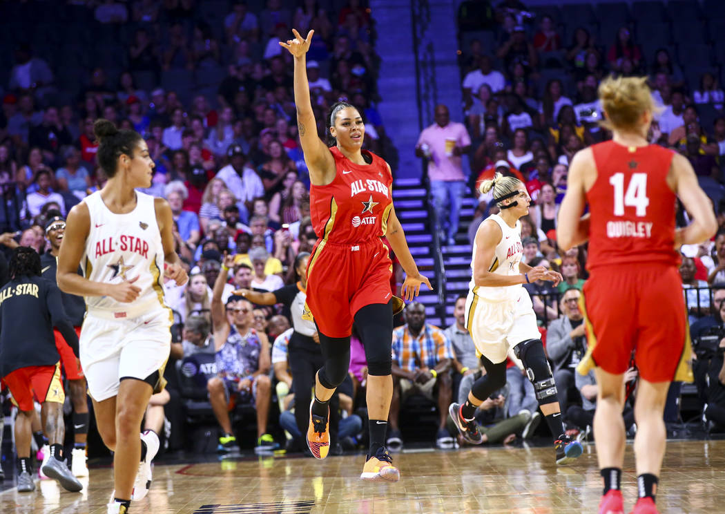 Las Vegas Aces' Liz Cambage celebrates after scoring during the first half of the WNBA All-Star ...