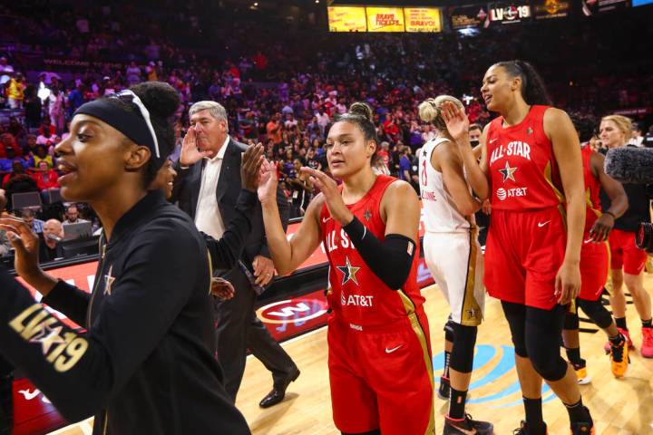 Chicago Sky's Diamond DeShields, from left, Las Vegas Aces' Kayla McBride, and Las Vegas Aces' ...