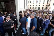People arrive to pay respect in the church where Carabinieri officer Mario Cerciello Rega was l ...