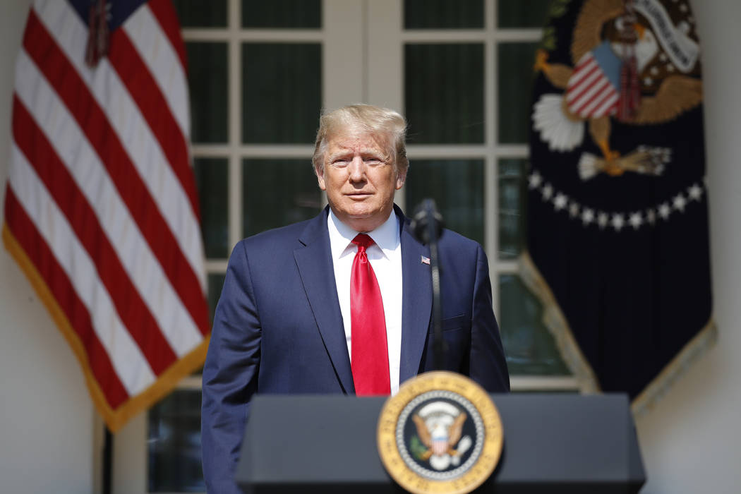 President Donald Trump walks out to speak before signing H.R. 1327, an act ensuring that a vict ...