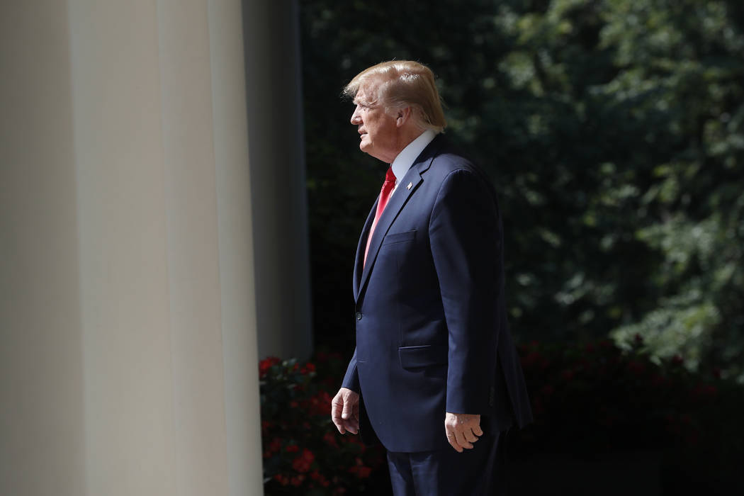 President Donald Trump walks out to speak before signing H.R. 1327, an act ensuring that a vict ...