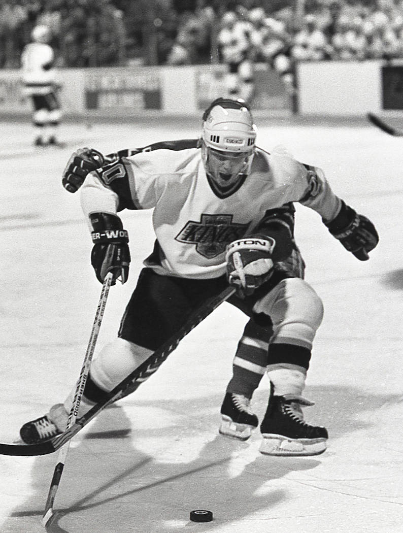 Scenes from an outdoor NHL exhibition game between the New York Rangers and the Los Angeles Kin ...