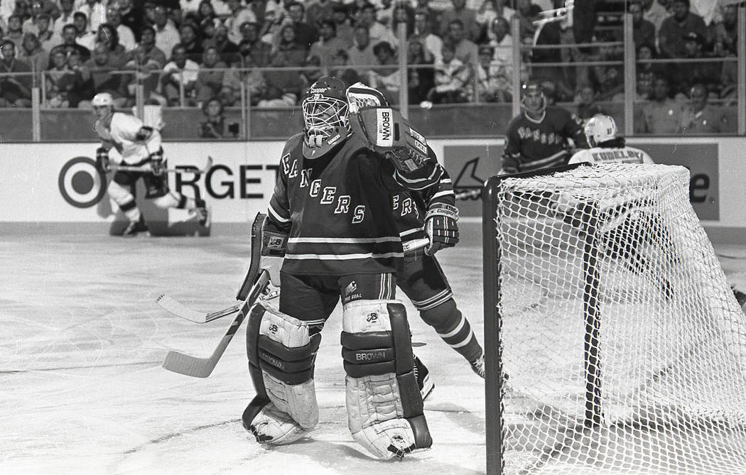 Scenes from an outdoor NHL exhibition game between the New York Rangers and the Los Angeles Kin ...