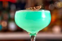 Grasshopper drink with grasshopper on the rim prepared by bartender Sarah Contois at the Smashe ...