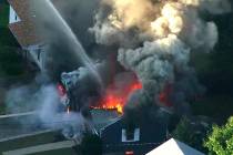 FILE - In this Sept. 13, 2018 file image from video provided by WCVB in Boston, flames consume ...