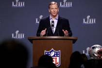 NFL Commissioner Roger Goodell answers a question during a news conference for the NFL Super Bo ...