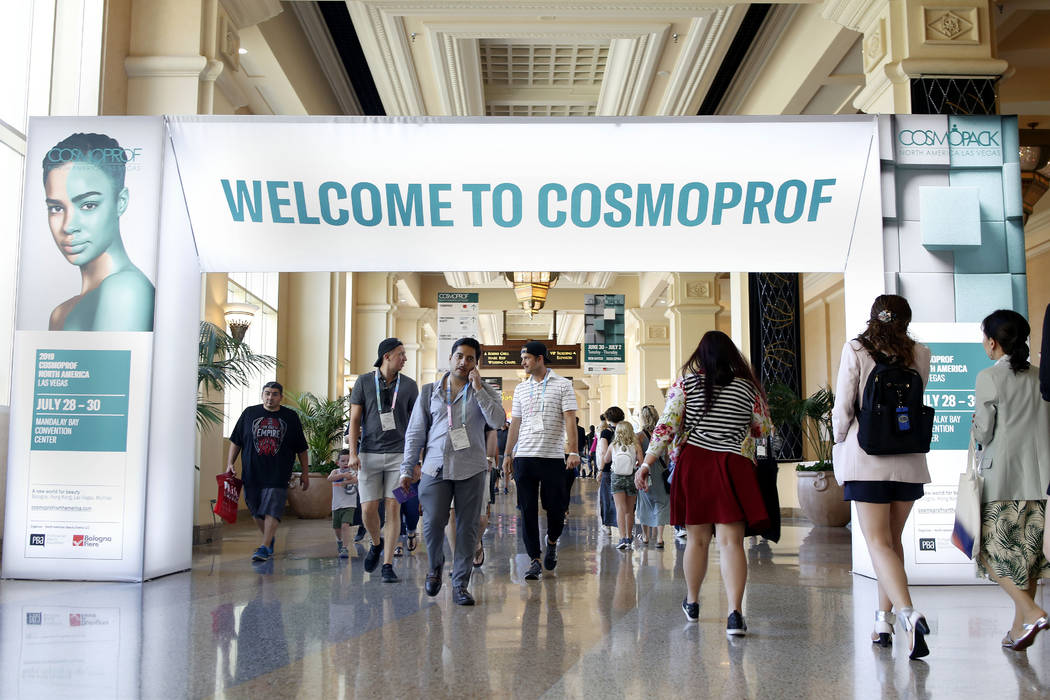 Vendors and retailers of Cosmoprof North America come and go from the convention at the Mandala ...