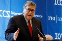 FILE - In this July 23, 2019 file photo U.S. Attorney General William Barr addresses the Intern ...