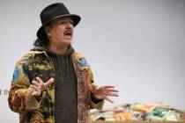Carlos Santana speaks during a visit to the Spread the Word Nevada offices and warehouse in Hen ...