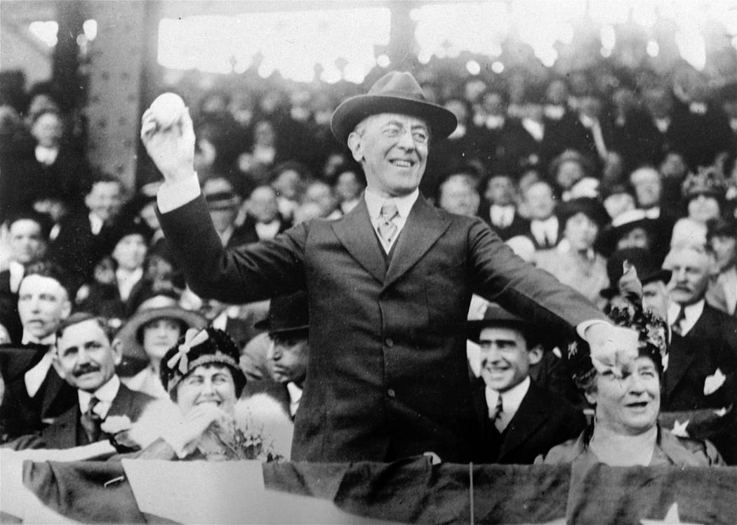 FILE - In this 1916 file photo, President Woodrow Wilson throws out the first ball at a basebal ...