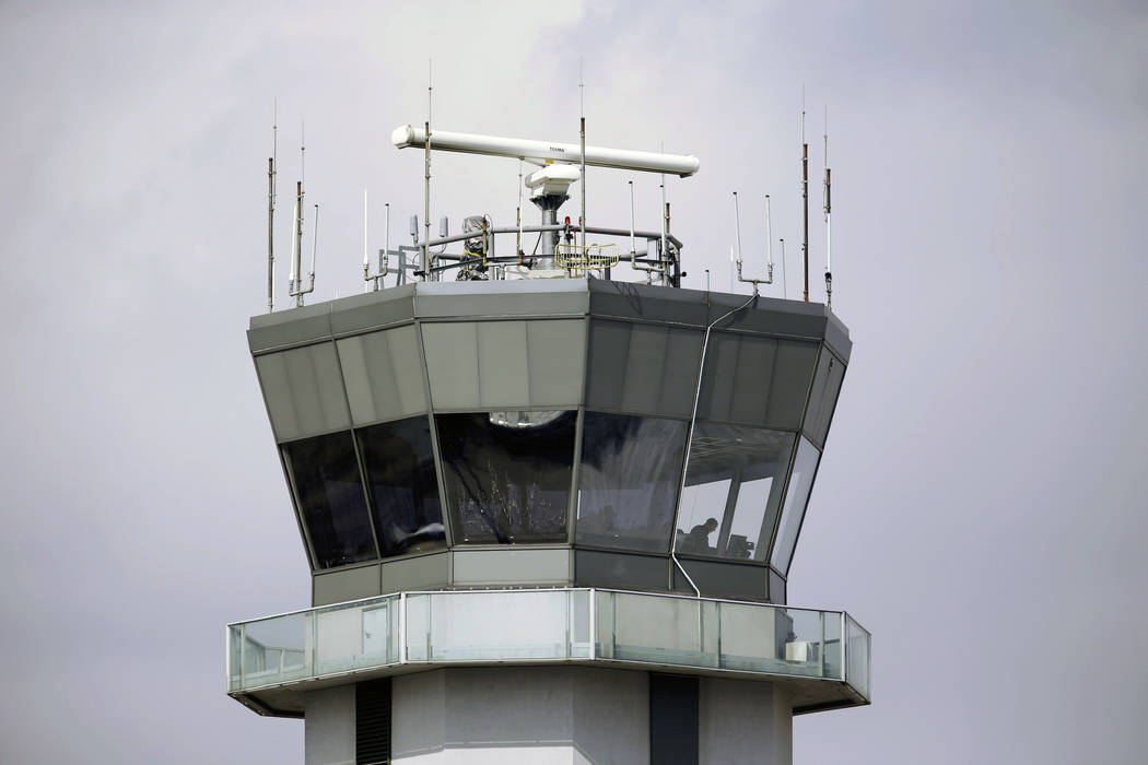 A March 12, 2013, file photo shows the air traffic control tower at Chicago's Midway Internatio ...