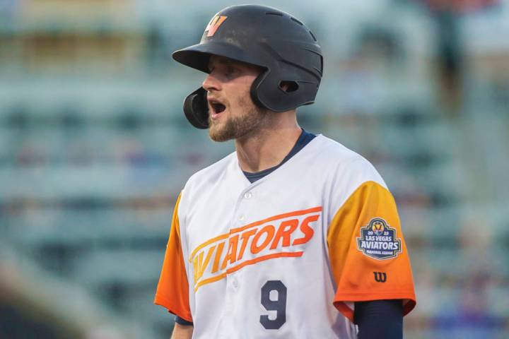 Las Vegas Aviators first baseman Seth Brown (9) pumps up his teammates after singling in the bo ...