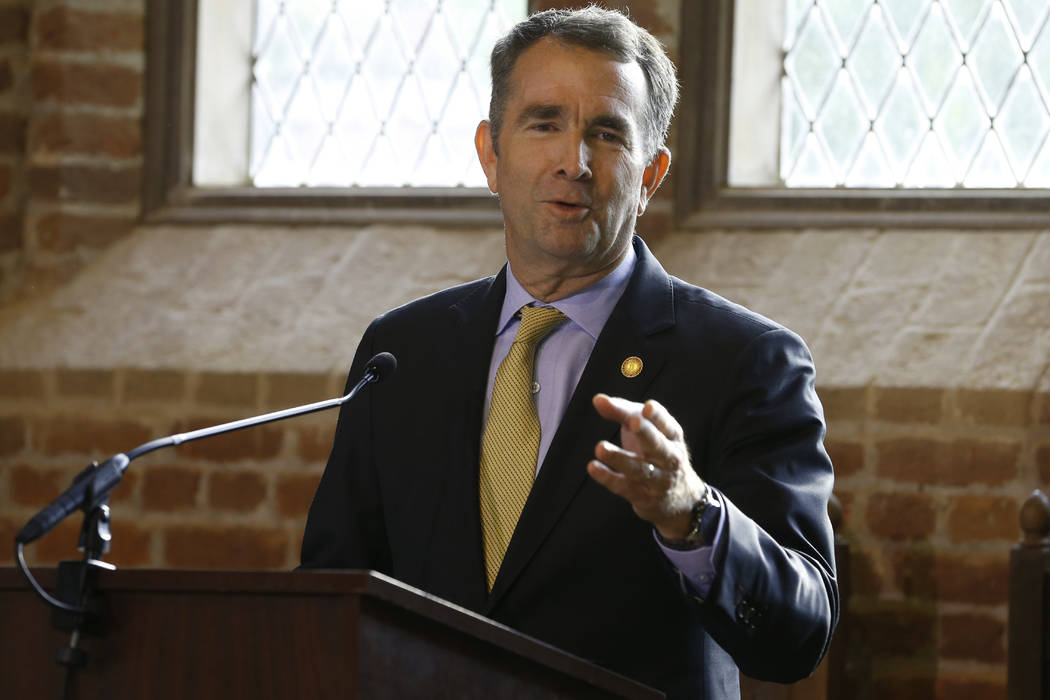 Virginia Gov. Ralph Northam addresses a commemorative meeting of the Virginia General Assembly ...