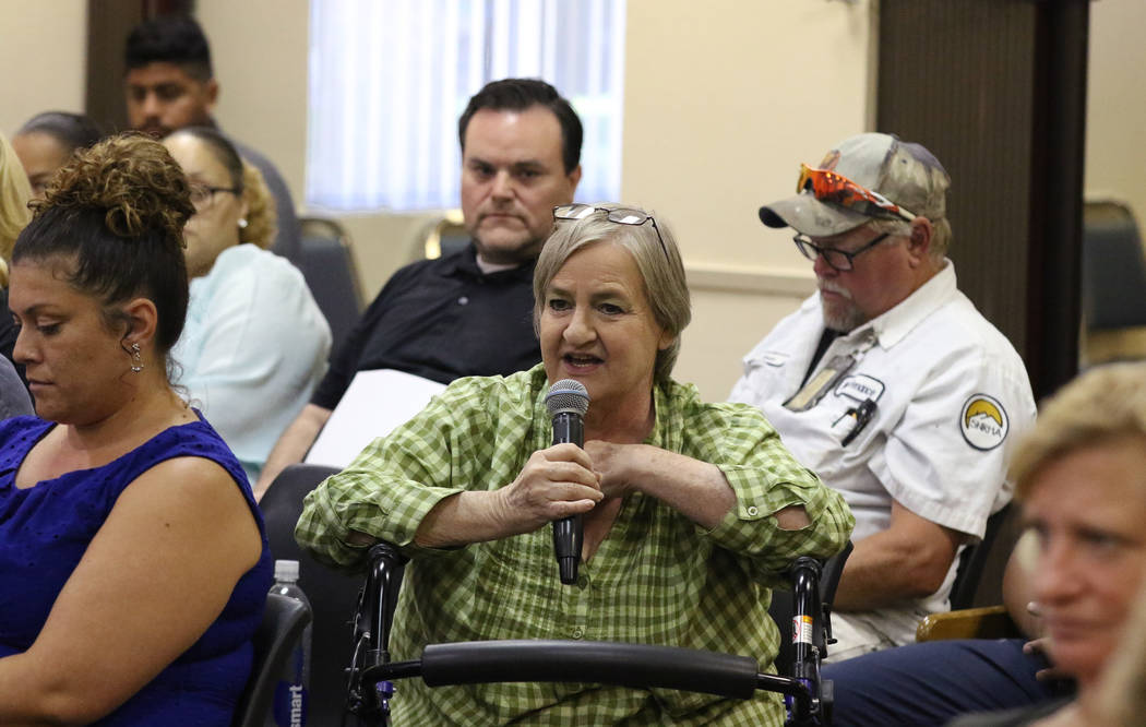 Southern Nevada Regional Housing Authority employee Martha Floyd speaks during the SNRHA's spec ...