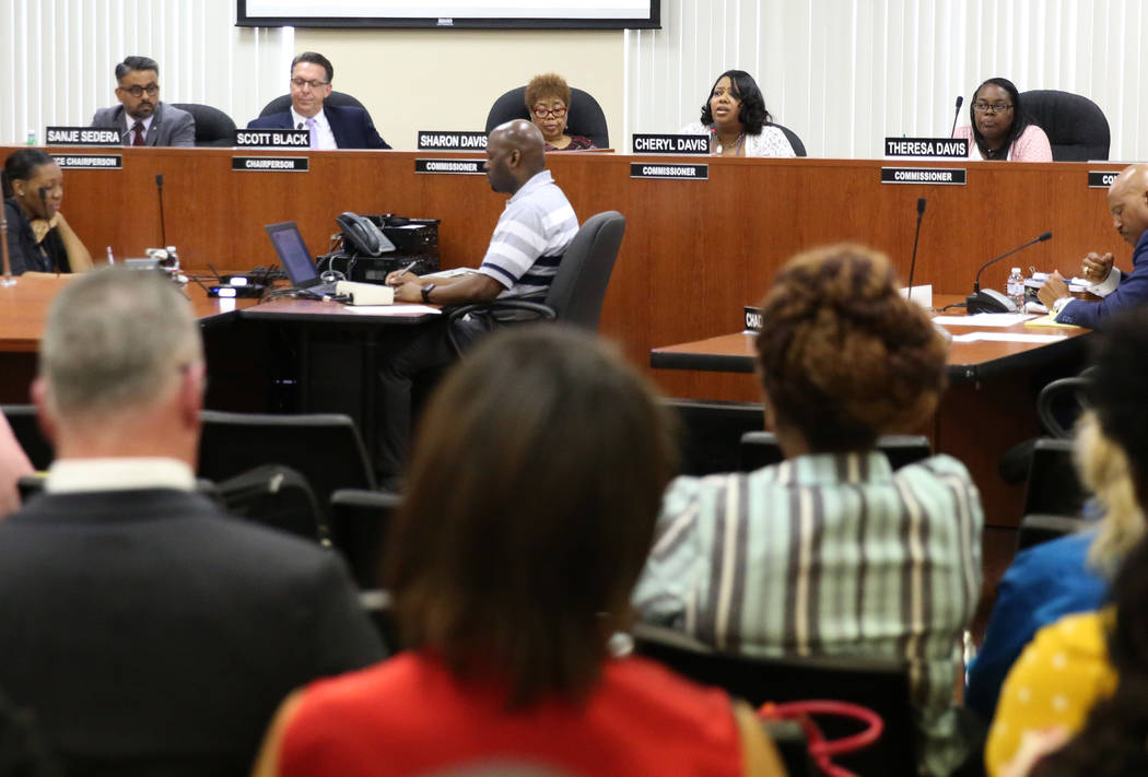 Southern Nevada Regional Housing Authority Resident Commissioner Cheryl Davis, second right, sp ...