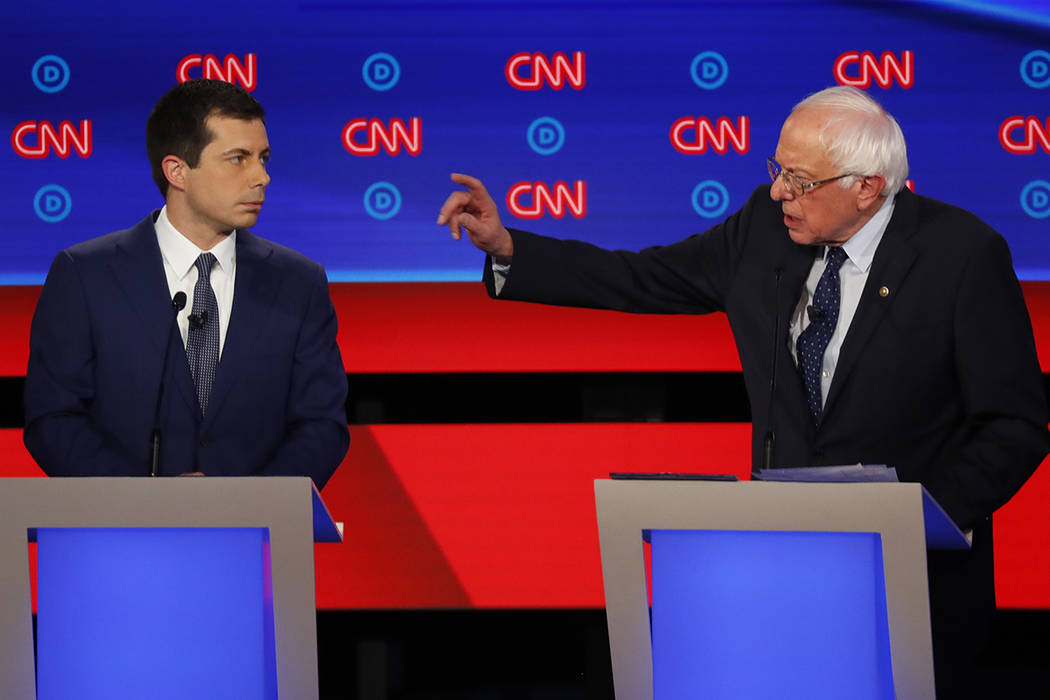 South Bend Mayor Pete Buttigieg and Sen. Bernie Sanders, I-Vt., participate in the first of two ...
