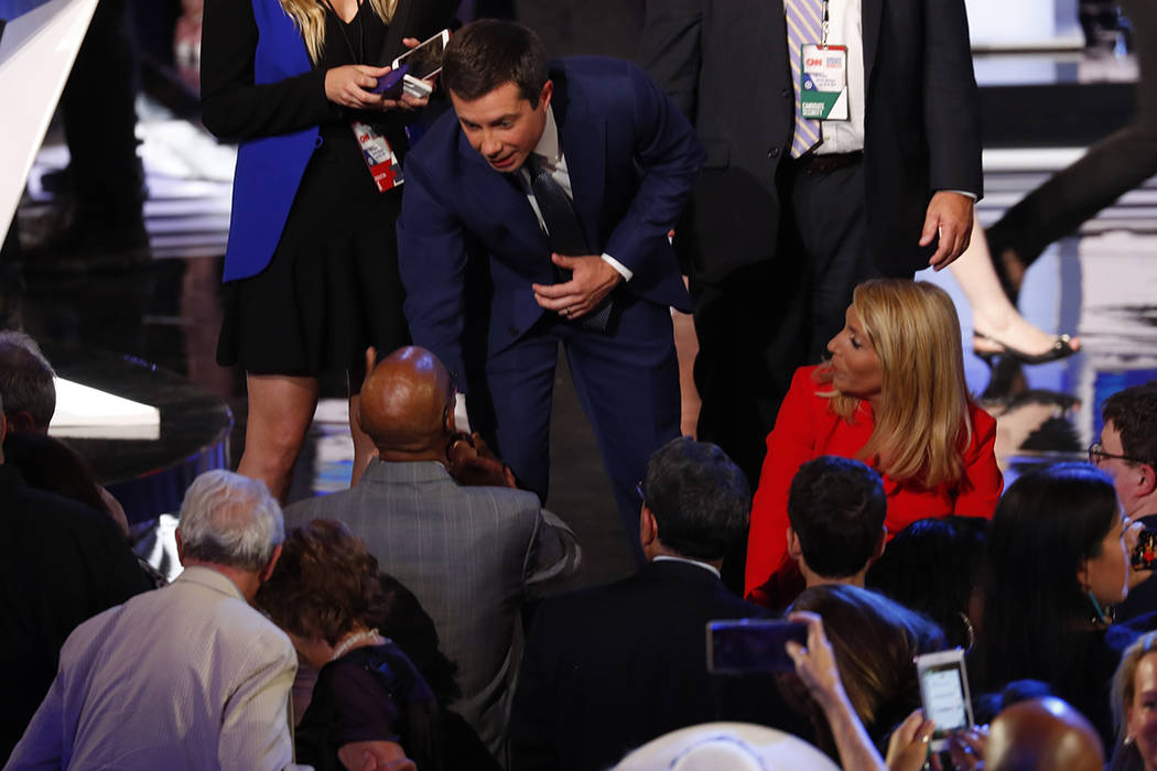 South Bend Mayor Pete Buttigieg shakes hands after the first of two Democratic presidential pri ...