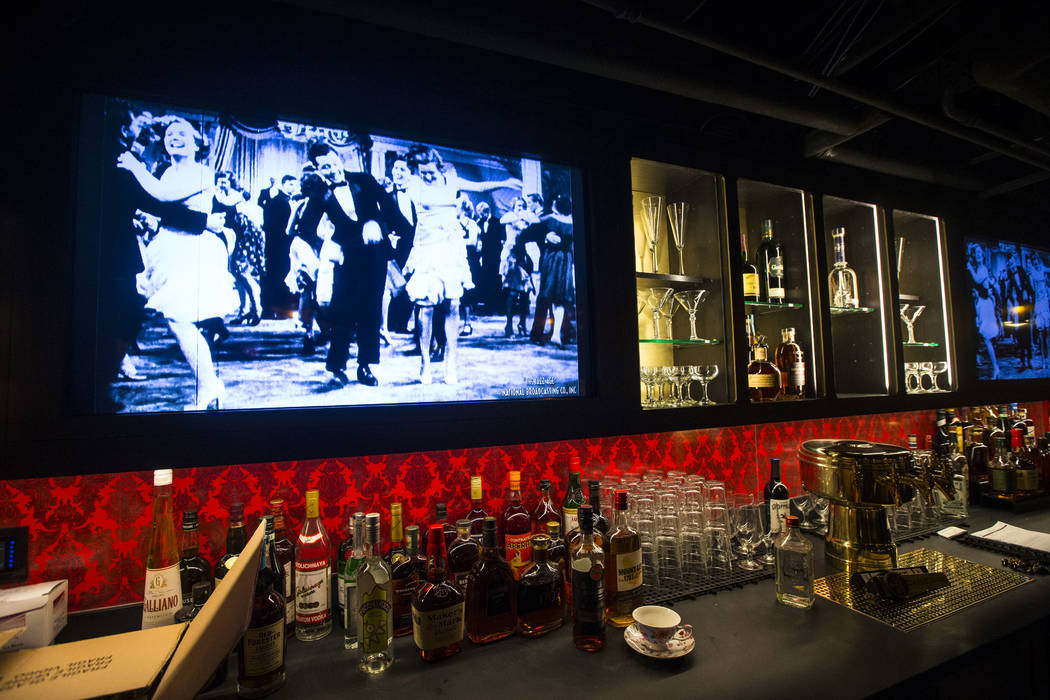Final touches are made at the bar area of the speakeasy at The Underground at The Mob Museum in ...