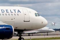 A Delta Air Lines pilot suspected of drinking before his flight at Minneapolis-St. Paul Interna ...