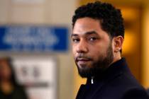 FILE - In this March 26, 2019, file photo, actor Jussie Smollett talks to the media before leav ...