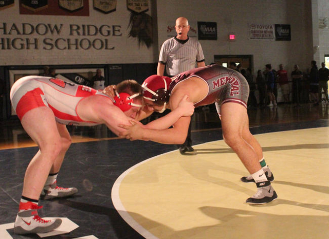 Arbor View‘s Austin Heese and Cimarron-Memorial‘s Nathaniel Garcia lock up durin ...