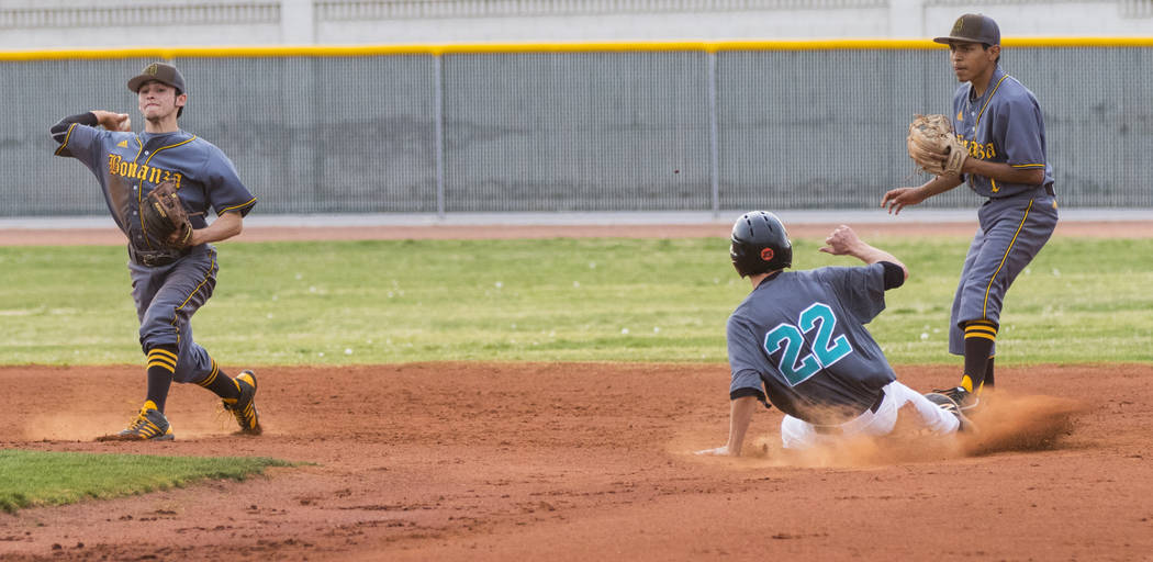 Silverado pitcher Tyler Paasche (22) slides into second base in the second inning during a b ...