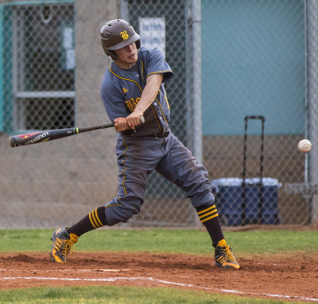 Bonanza shortstop Luis Lares (17) hits a single in the third inning during a baseball game a ...