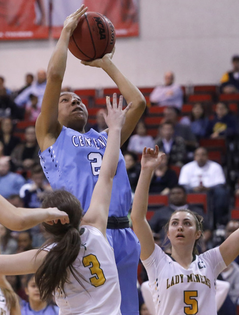 Centennial’s Samantha Thomas (25) shoots over Bishop Manogue’s Ashley Sprouse (3 ...