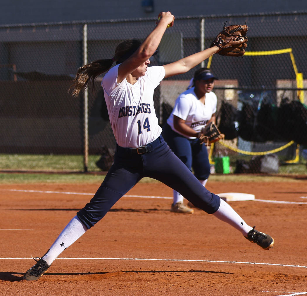 Shadow Ridge pitcher Shelbi Denman (14) throws a pitch in the first inning during a softball ...