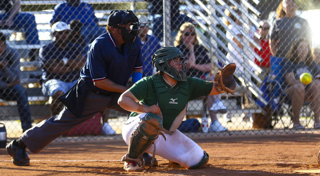 Palo Verde catcher Grace Chavez (25) catches the ball in the sixth inning during a softball ...