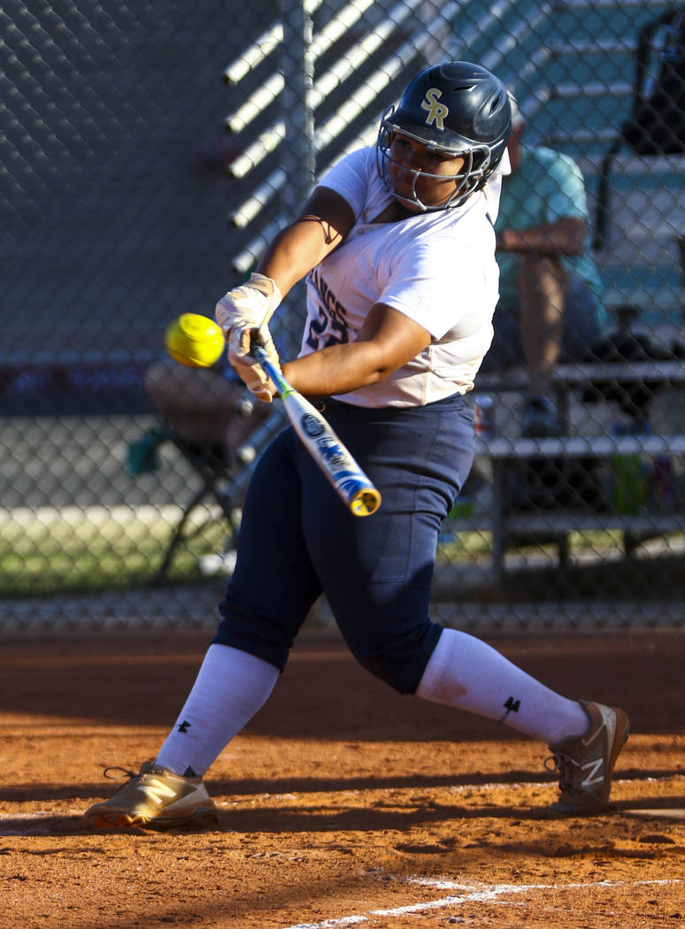 Shadow Ridge first baseman Alyssa Stanley (22) hits a double in the sixth inning during a so ...