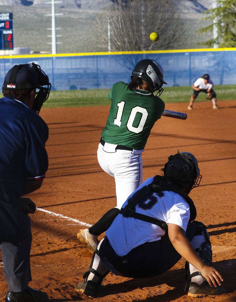 Palo Verde infielder Richmond Garcia (10) hits the ball in the sixth inning during a softbal ...