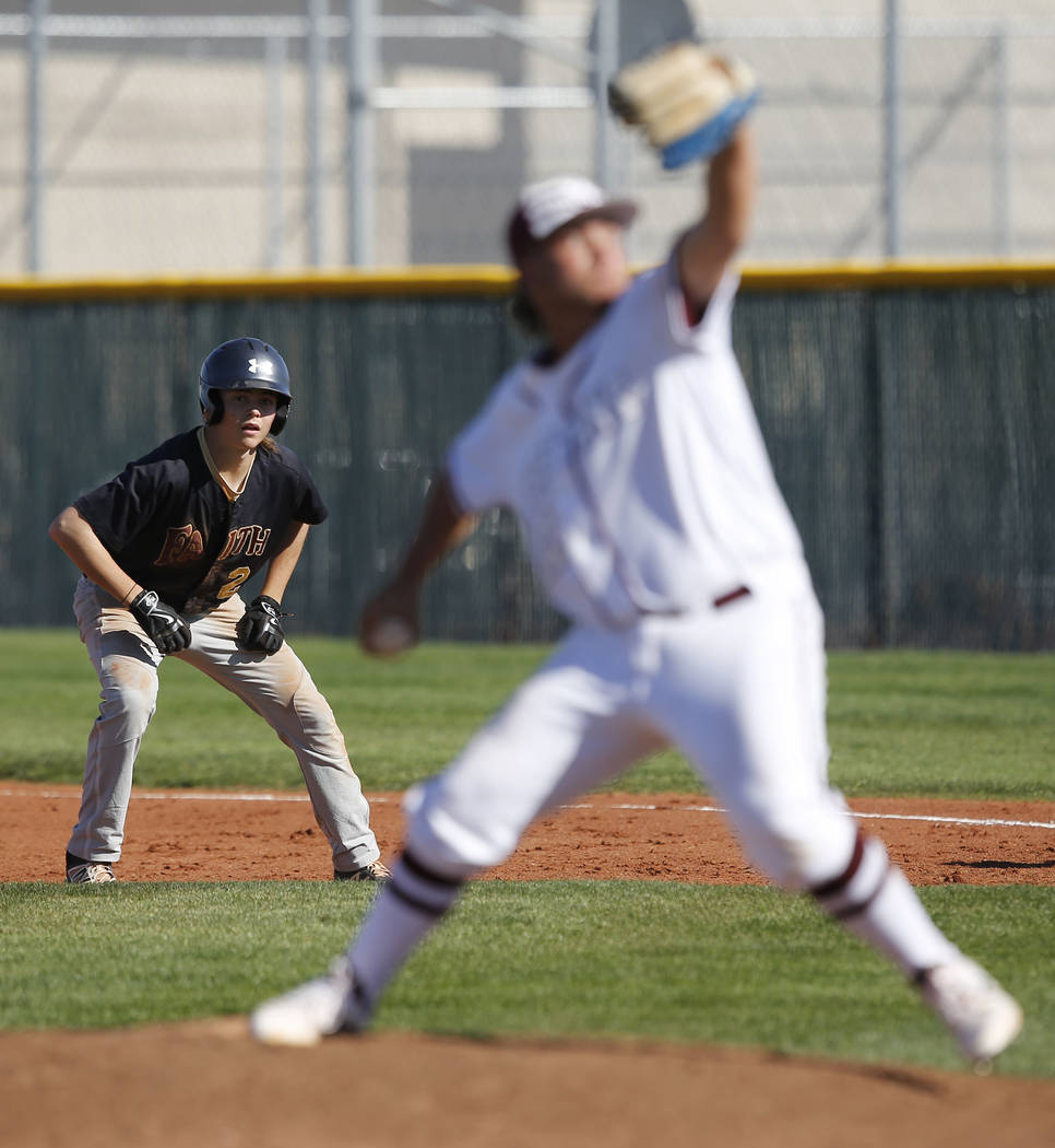 Faith Lutheran’s Paulshawn Pasqualotto (2) leads off first base as Cimarron-Memorial&# ...