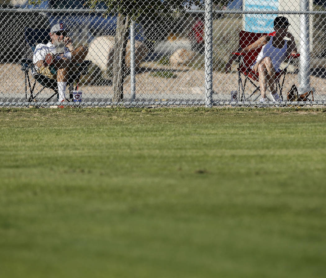 Spectators watch a high school baseball game on Tuesday, March 14, 2017, in Las Vegas. (Chri ...