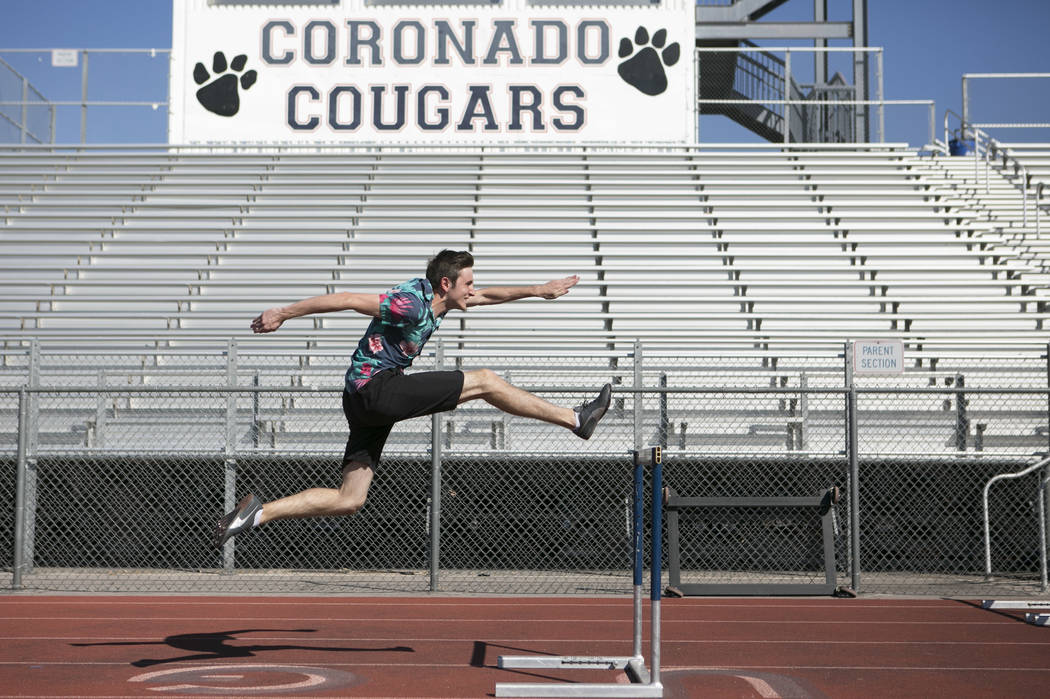 Braeden Traficanti practices hurdles during a track and field practice at Coronado High Scho ...