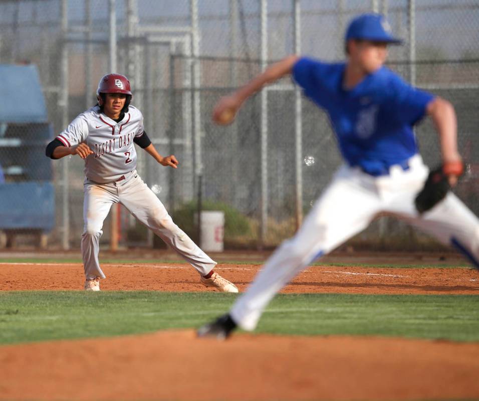 Desert Oasis’s Andrew Martinez (2) leads off first base during the sixth inning of a h ...