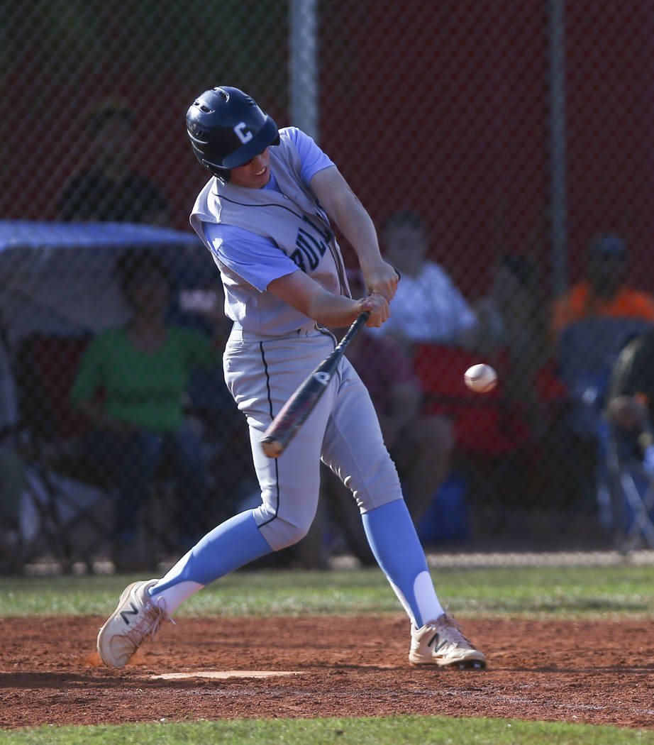 Centennial’s Jake Rogers (42) hits the ball allowing two runs during a baseball game a ...