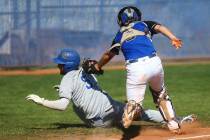 Basic’s Roger Riley (3) tags out Santa Margarita’s Derek Park (5) during a baseb ...