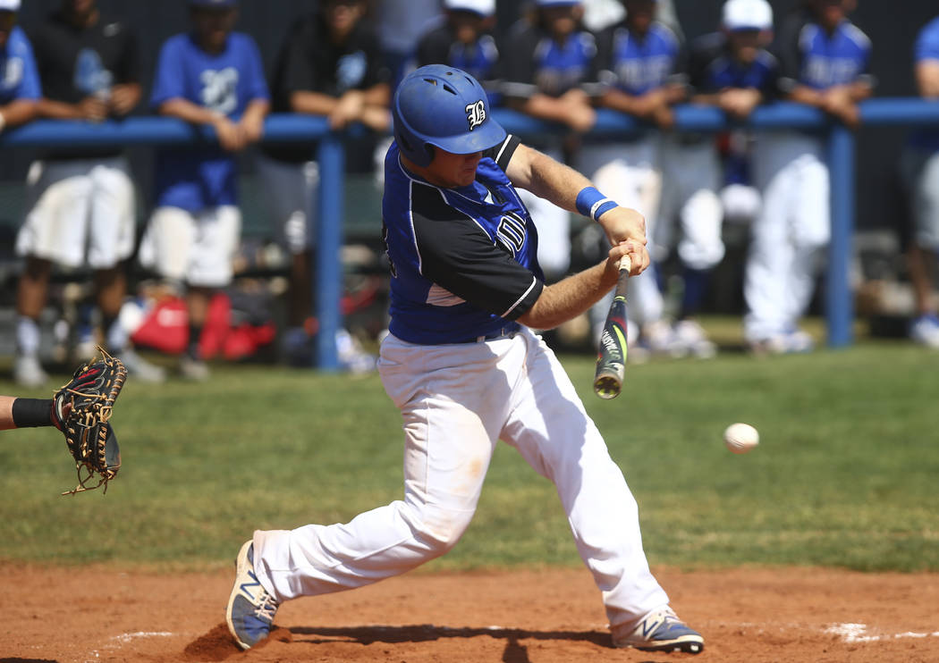 Basic’s Trace Evans (18) bats against Santa Margarita during a baseball game at Basic ...