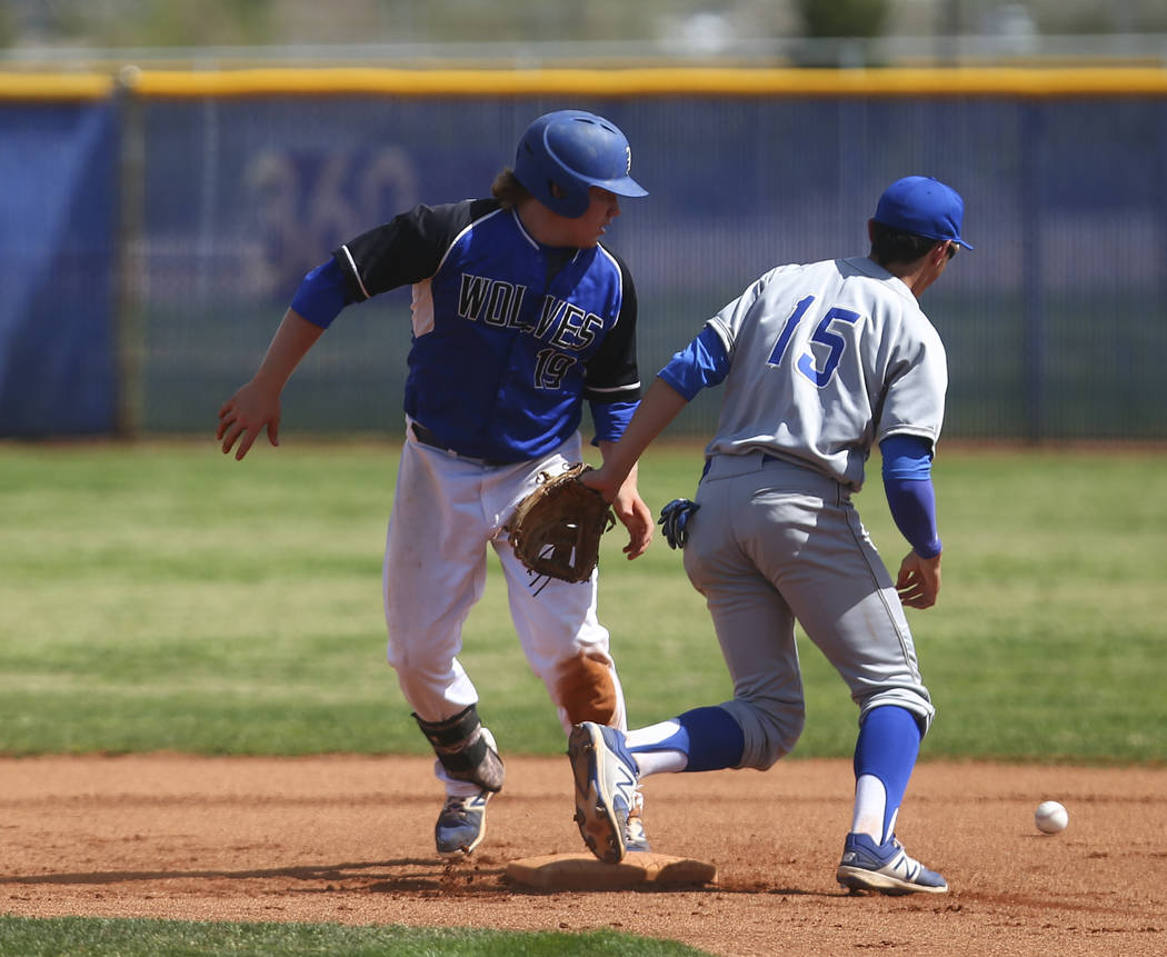 Basic’s Jack Wold (19) makes it safely to second base against Santa Margarita’s ...