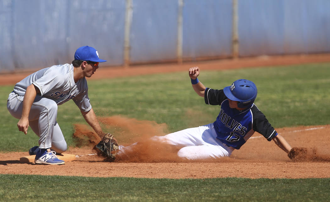 Santa Margarita’s Joey Myers (2) tags out Basic’s Brady Clark (12) during a base ...