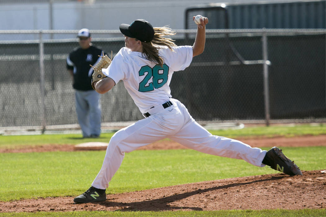 Silverado senior Kevin Pindel (28) pitches to Rancho at Silverado High School on Tuesday, Ma ...