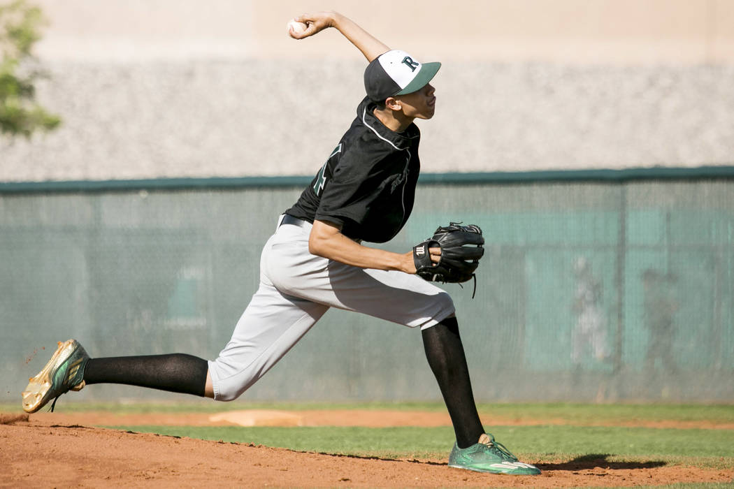 Rancho senior Michael Shy (24) pitches to Silverado at Silverado High School on Tuesday, Mar ...