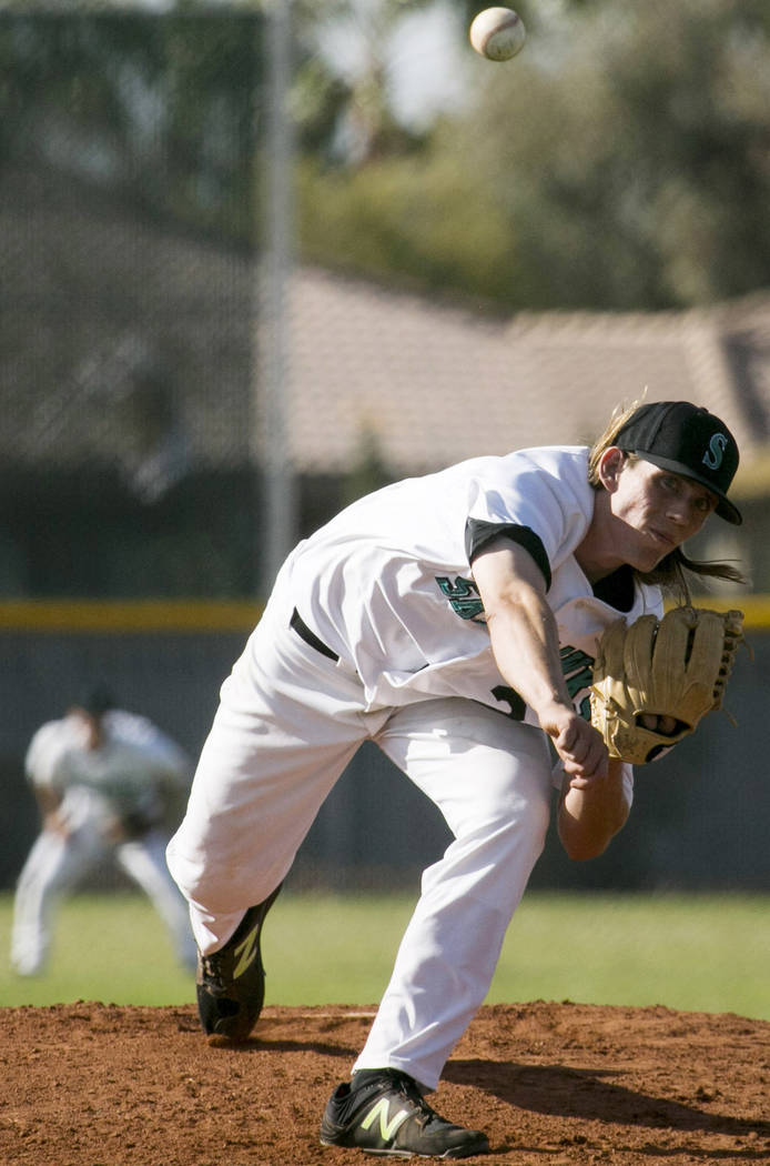 Silverado senior Kevin Pindel (28) pitches to Rancho at Silverado High School on Tuesday, Ma ...
